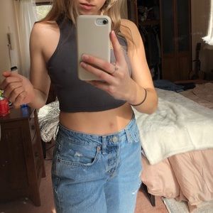 Mid rise distressed light-wash boyfriend denim